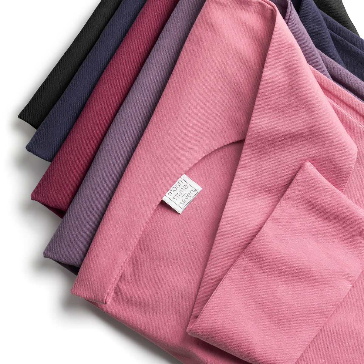 MoonstoneSeven hair plops flat laid in mauve, plum, berry bliss, navy, and black color options