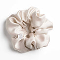 Bottoms Up satin scrunchie for curly and wavy hair, gentle on strands and snag-free.
