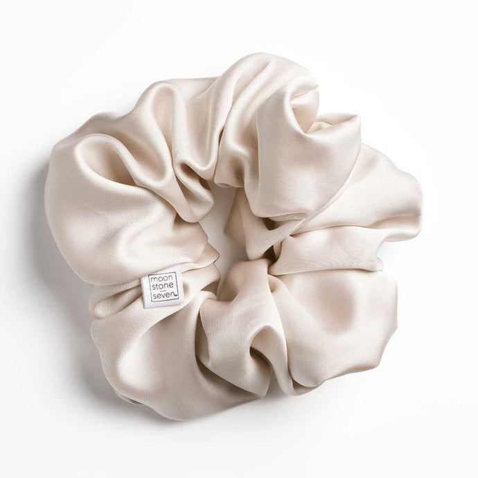 Bottoms Up satin scrunchie for curly and wavy hair, gentle on strands and snag-free.