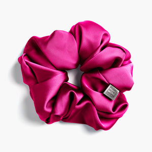 Fushia Flair satin scrunchie for curly and wavy hair, gentle on strands and snag-free.