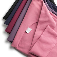 MoonstoneSeven hair plops flat laid in mauve, plum, berry bliss, navy, and black  color options