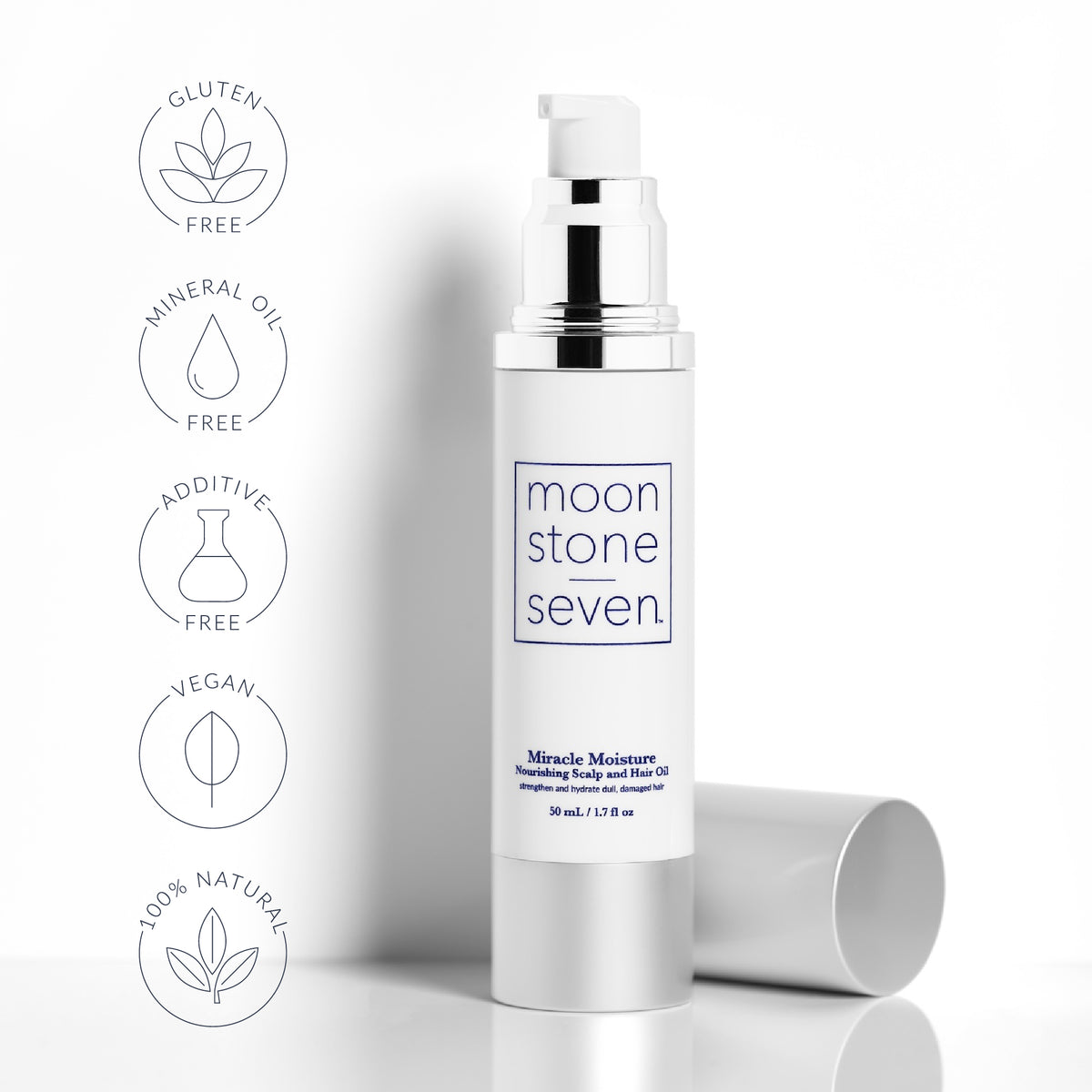 Open bottle of MoonstoneSeven Miracle Moisture Oil with callouts for 100% natural, vegan, additive-free, and mineral oil-free formula