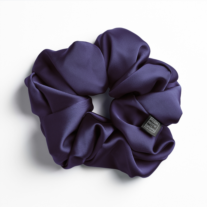 Plum satin scrunchie for curly and wavy hair, gentle on strands and snag-free.