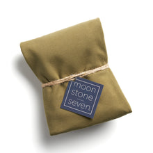 Load image into Gallery viewer, An olive hair plop, which is cut fabric folded into a rectangle and tied with a piece of thin twine with a navy blue MoonstoneSeven product tag in the middle.  Edit alt text