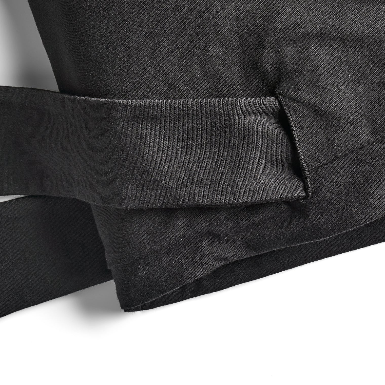 Eyelet detail on satin hair bonnet showing comfort-focused adjustable fit for all curl types