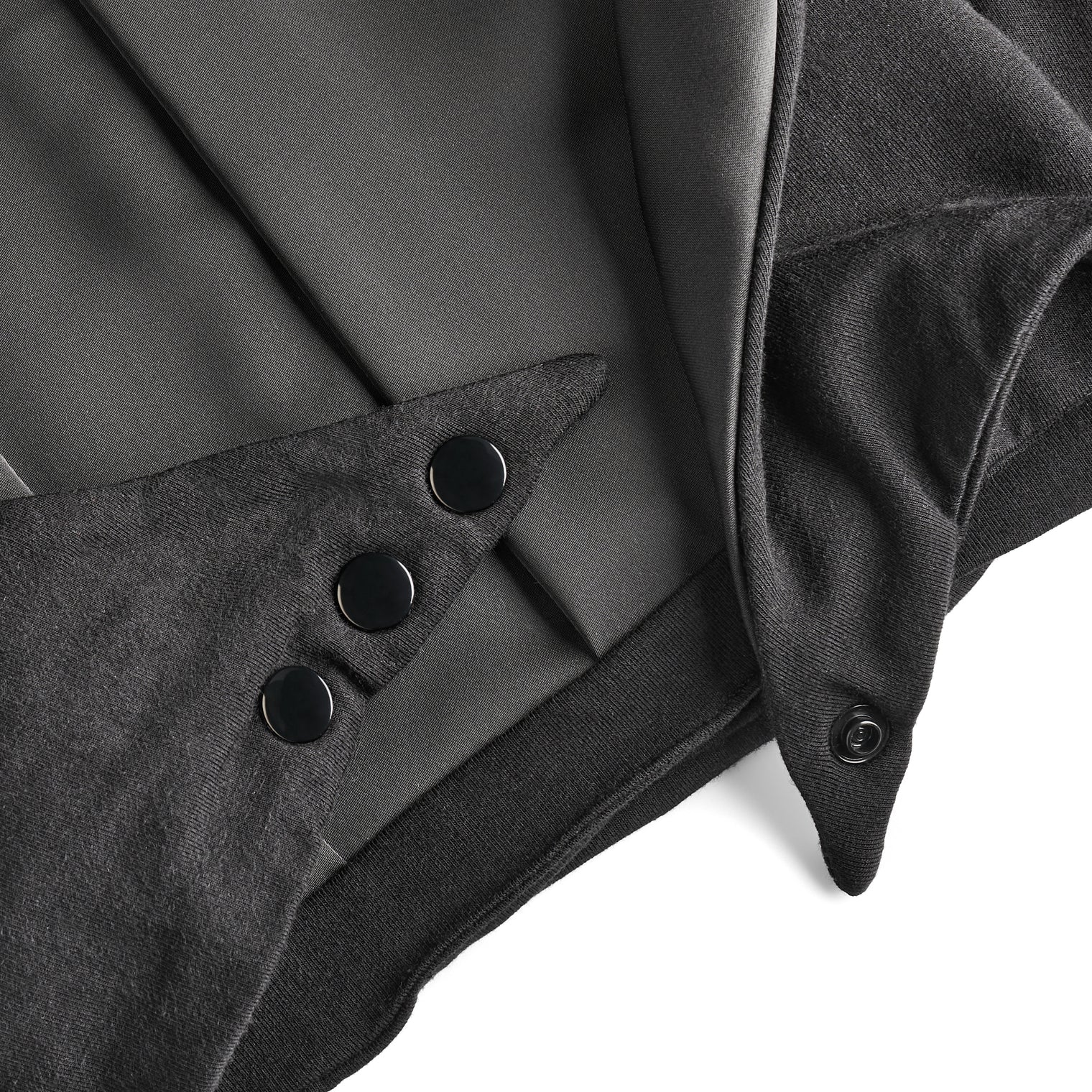 Close-up of MoonstoneSeven Satin Sleeper fabric and buttons showing soft satin texture and stitching detail